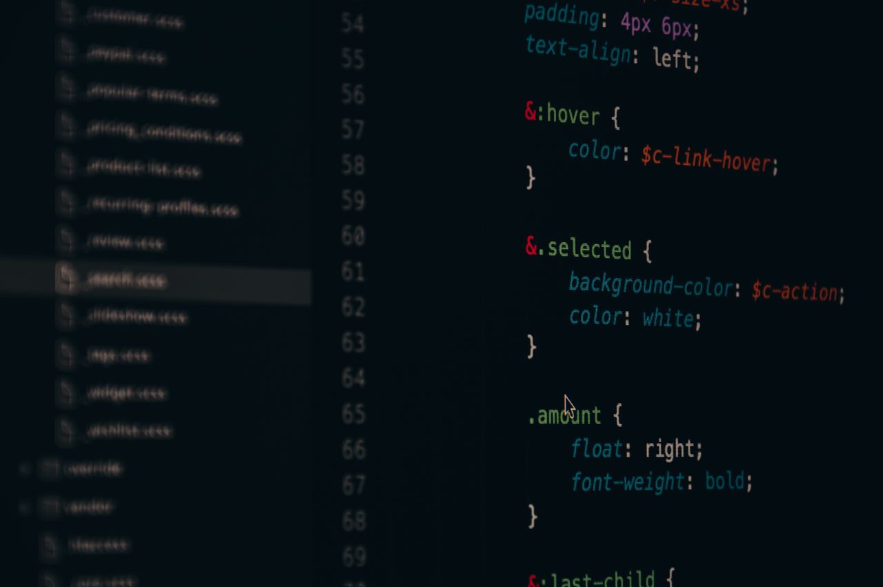 services-03 Close-up of colorful CSS code lines on a computer screen for web development.
